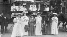 Suffragettes in 'Votes for Women' sashes, c1910. Artist: Unknown