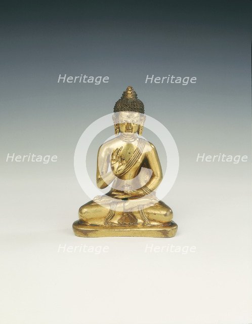 Gilt brass Amoghasiddhi, Buddha of infallible magic, Mongolia, 18th century. Artist: Unknown