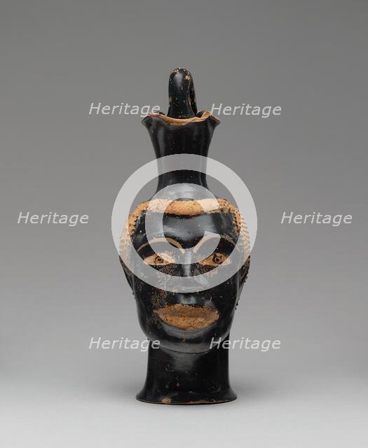 Pitcher (Oinochoe) in the Form of a Head of a Youth, about 510 BC. Creator: Class of Louvre H 62.