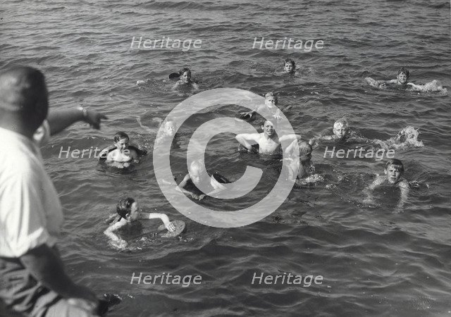 Boys having a swimming lesson, Sweden, 1939. Artist: Otto Ohm