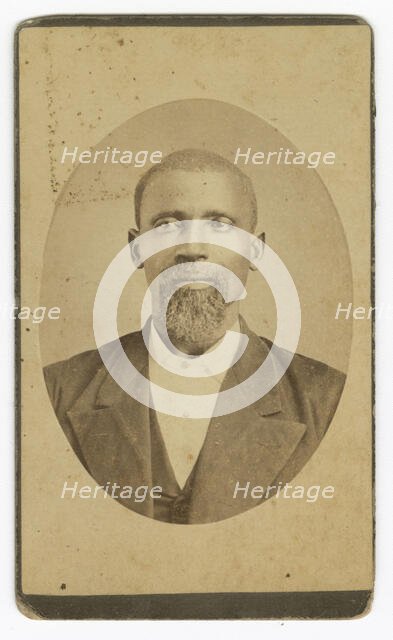 Photograph of a man with a beard wearing a dark colored suit and vest, late 19th cent - early 20th c Creator: Unknown.