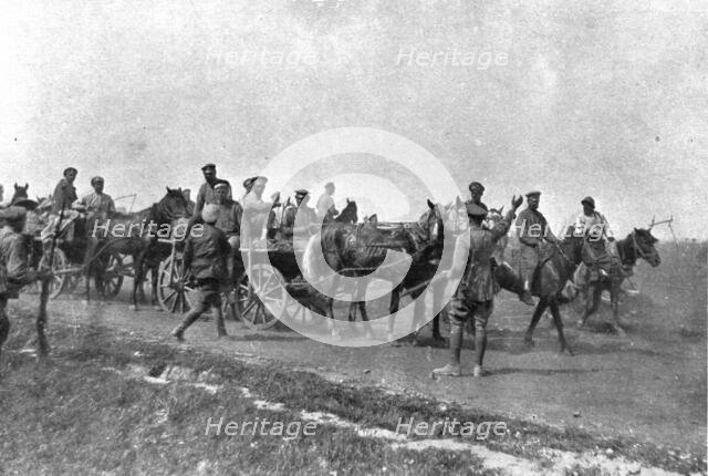 'Les Fuyards; Officiers russes et anglais des automobiles blindees arretant un convoi de..., 1917. Creator: Unknown.