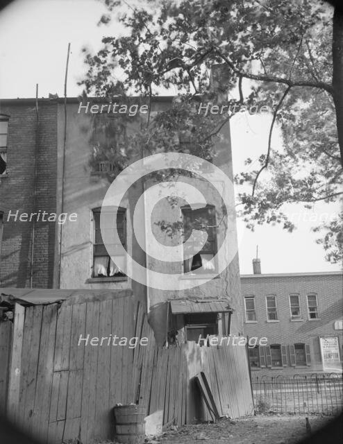 A home on Seaton Road in the Northwest area, Washington, D.C., 1942. Creator: Gordon Parks.