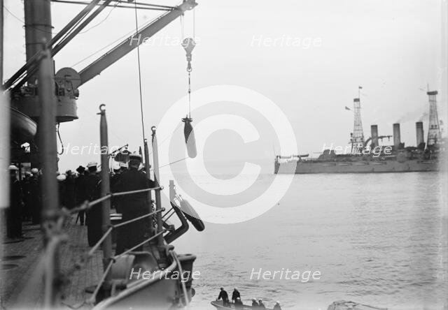 Target Practice - Hauling Torpedoes On Board, 1913. Creator: Unknown.