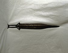 Sword of three parts barb, carp's tongue shaped blade, from Palma del Rio (Cordoba).