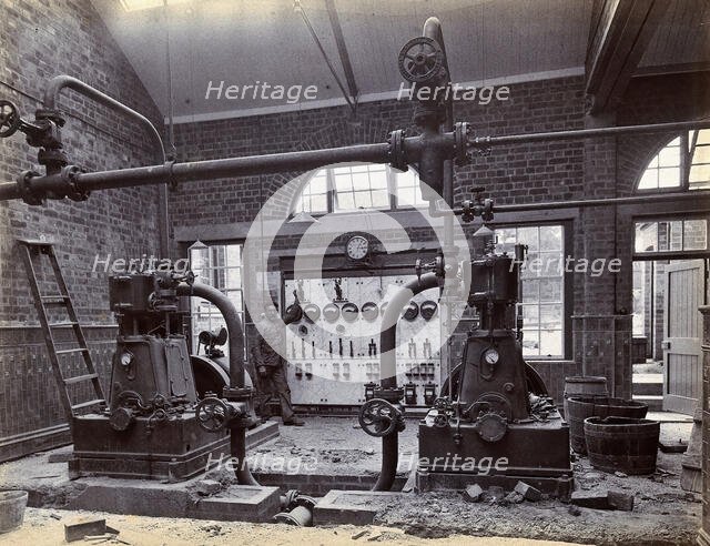 Johannesburg Hospital, South Africa: member of staff, possibly in the boiler room, c1905. Creator: Unknown.