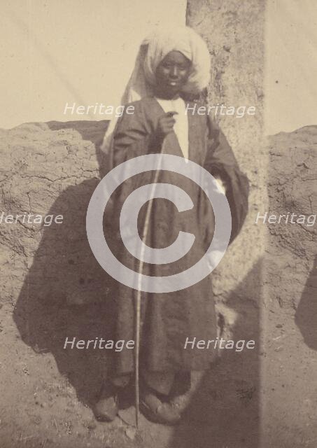 Portrait of a Young North African Man Standing Against a Pillar, 1865. Creator: Théodule Deveria.