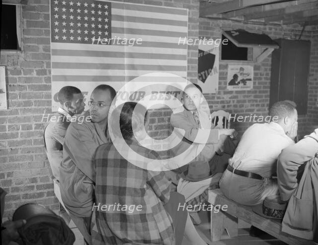 Air raid wardens' meeting in zone nine, Southwest area, Washington, D.C, 1942. Creator: Gordon Parks.