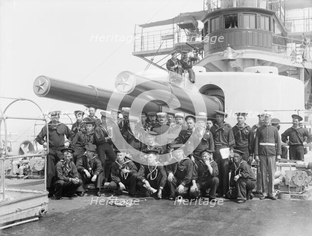 U.S.S. Iowa, group under 12-inch guns, (1898?). Creator: Edward H Hart.