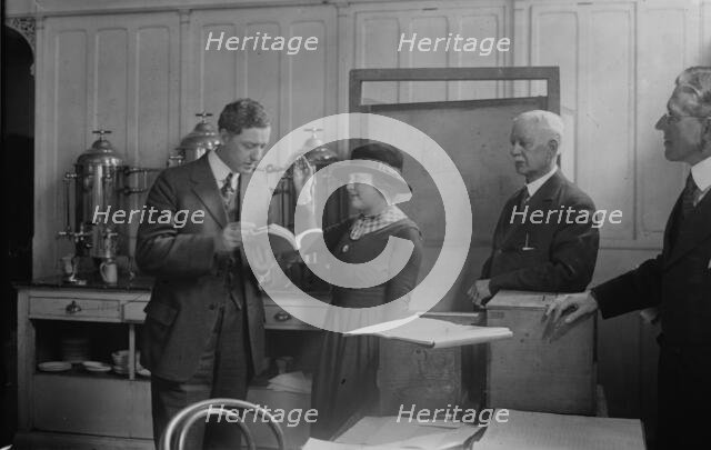 Swearing in a vote, Helen Moser, G.S. Mitchell, 1918. Creator: Bain News Service.