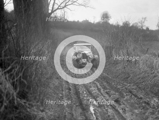 MG 18/80 of N Chichester-Smith competing in the MG Car Club Trial, Kimble Lane, Chilterns, 1931. Artist: Bill Brunell.