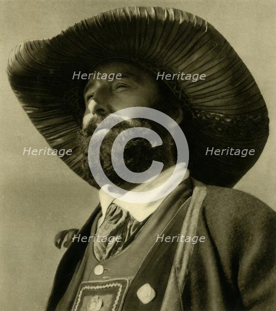 Man in traditional costume, Tyrol, Austria, c1935.  Creator: Unknown.