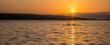 Rowing in the Sun Rise. Creator: Dorte Verner.