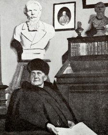 Mme Dostoevsky at work in the Dostoevsky room of the Moscow Historical Museum, 1916. Creator: Unknown.