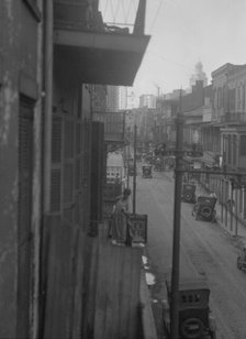 Street scene, New Orleans or Charleston, South Carolina, between 1920 and 1926. Creator: Arnold Genthe.