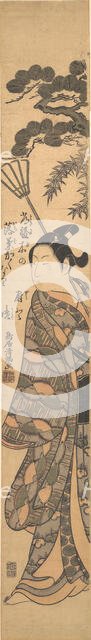 A Tall Young Man Carrying a Bamboo Rake Over His Left Shoulder, ca. 1763., ca. 1763. Creator: Torii Kiyomitsu.