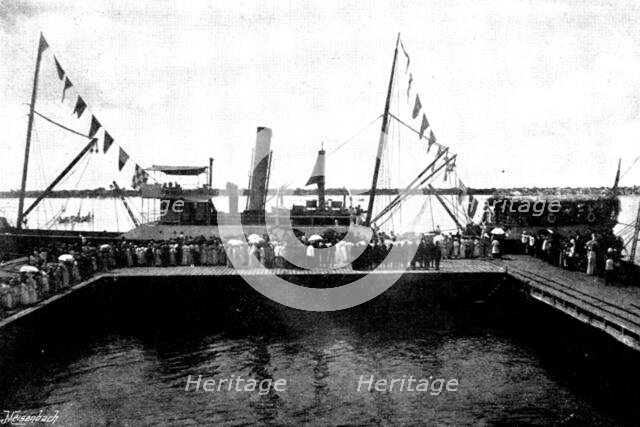 Arrival, and Subsequent Death, of Lady Carter at Lagos: Lady Carter landing at Lagos, 1895. Creator: George Meisenbach.