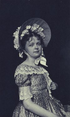 Woman wearing a bonnet, c1900. Creator: Emily G Mew.