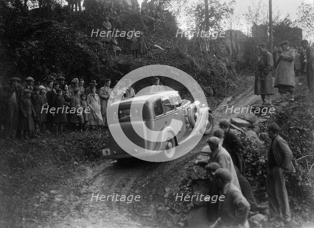 1934 Standard Sixteen taking part in a Standard Car Owners Club trial. Artist: Bill Brunell.