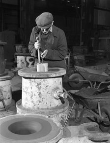 Moulding in the Wombwell Foundry, South Yorkshire, 1963.  Artist: Michael Walters