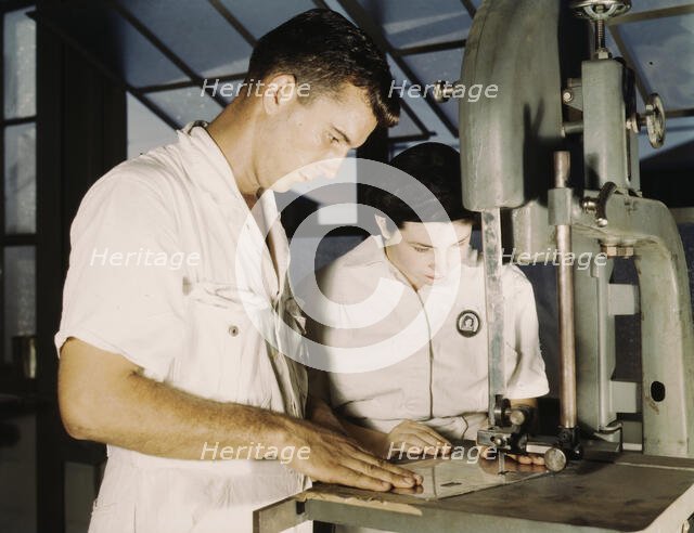 NYA employees receiving training in the Assem..., U.S. Naval Air Base, Corpus Christi, Texas, 1942. Creator: Howard Hollem.