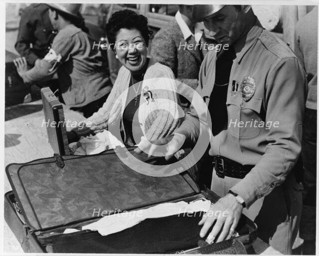 Japanese relocation, California, 1942. Creator: Dorothea Lange.