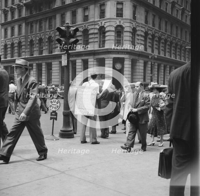 Street hawker selling Consumer's..., 42nd Street and Madison Avenue, New York City, 1939. Creator: Dorothea Lange.
