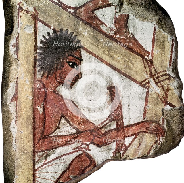 Painted limestone relief depicting a carpenter, Ancient Egyptian, 19th dynasty, c1295-1186 BC. Artist: Werner Forman