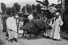 Marriage custom, Uganda, 1920.Artist: CW Hattersley