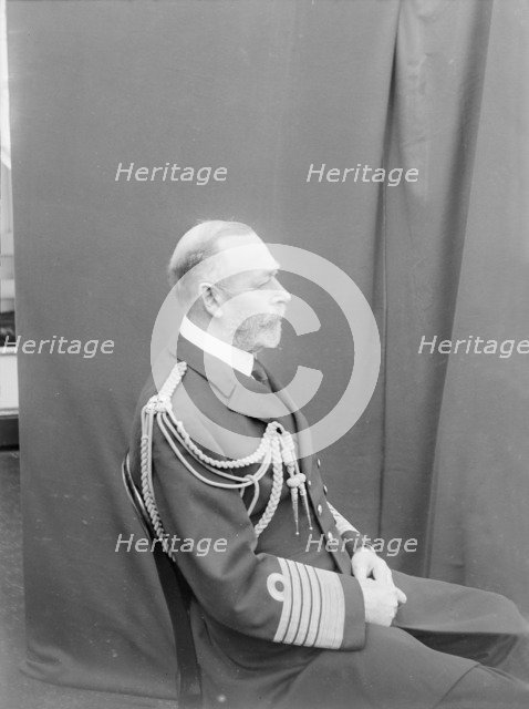 Studio portrait of George V taken aboard 'HMY Victoria and Albert', c1935. Creator: Kirk & Sons of Cowes.