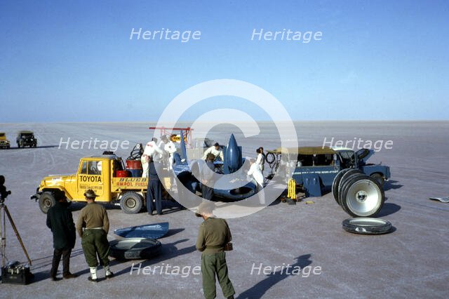 Mechanics fuelling Bluebird CN7 for World Land Speed Record attempt, Lake Eyre, 1964. Creator: Unknown.