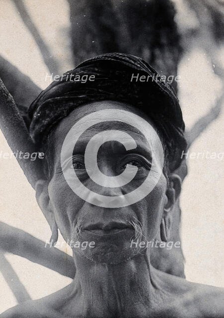 Sarawak: Tama Kulieng, a chief of the Butang Kayan River tribe, c1900.. Creator: Unknown.