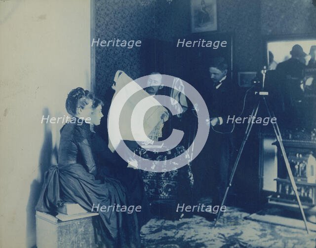 Two unidentified women being photographed, c1890. Creator: Frances Benjamin Johnston.