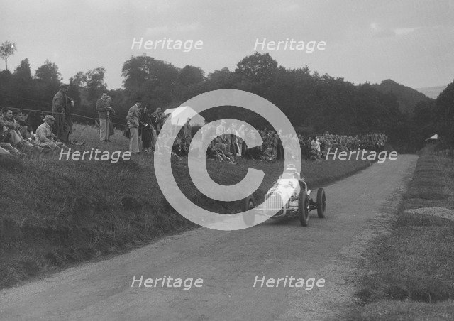 Austin 7 of LP Driscoll competing in the MAC Shelsley Walsh Speed Hill Climb, Worcestershire, 1935. Artist: Bill Brunell.