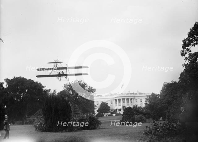 Atwood, Harry. Aviator. Rising From White House Lawn In Wright Type B Plane, July, 1911. Creator: Harris & Ewing.