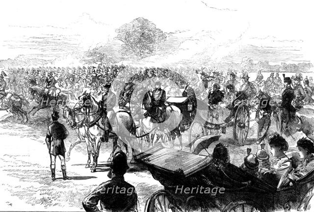 Review of the Household Brigade by the Queen, in Bushey Park, 1871. Creator: Unknown.
