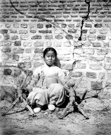 Korean girl with dolls, 1900. Artist: Unknown