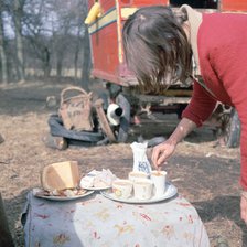 Gipsy woman making tea, Charlwood, Newdigate area, Surrey, 1964. 