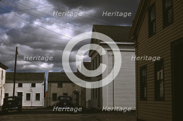 A square with old houses in an old fishing village, Stonington, Conn., 1940. Creator: Jack Delano.