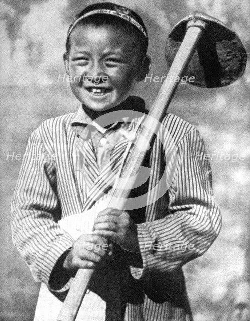 Uzbek schoolboy working on a farm, 1936. Artist: Unknown