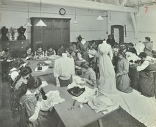 Dressmaking class, Hammersmith Trade School for Girls, London, 1911. Artist: Unknown.
