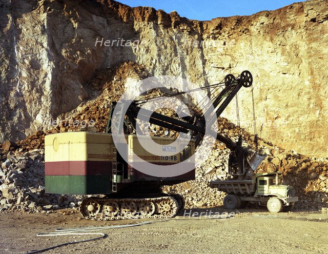 Ruston-Bucyrus 110-RB face shovel loading a Euclid dumper, Steetley quarry, Nottinghamshire, 1967. Artist: Michael Walters