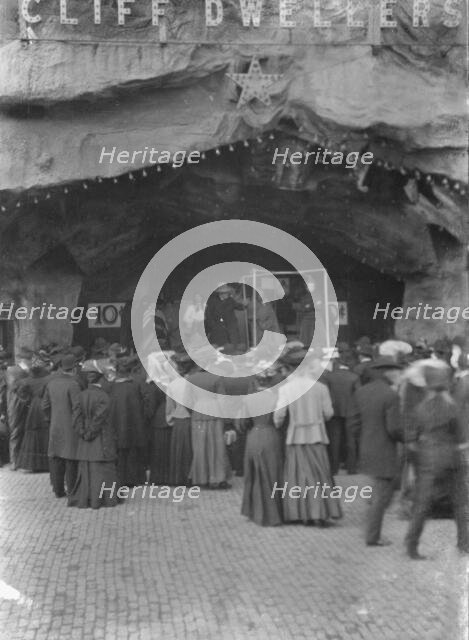 Sidewalk performance or carnival performance, Cliff Dwellers, between 1896 and 1911. Creator: Arnold Genthe.