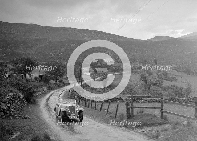 Singer Nine Sports of Miss MC Sherer competing in the RSAC Scottish Rally, 1936. Artist: Bill Brunell.