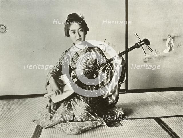 'The Indispensible Geisha', 1910. Creator: Herbert Ponting.