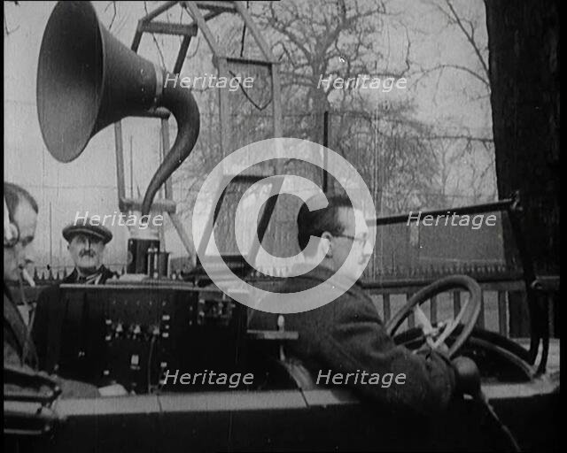 A Car on the Road Equipped with a Radio, an Aerial, and Speakers, 1922. Creator: British Pathe Ltd.