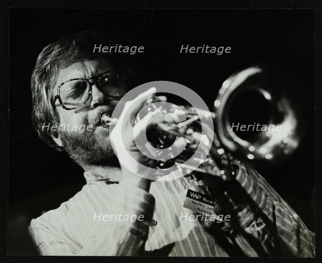 Henry Lowther playing the trumpet at The Stables, Wavendon, Buckinghamshire. Artist: Denis Williams