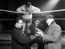 A miner from Sunderland gets some ringside boxing advise, Newcastle, 1964.  Artist: Michael Walters