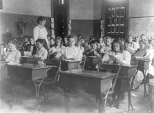 Washington, D.C. public schools, 1st Div. - class making geometric forms with paper, (1899?). Creator: Frances Benjamin Johnston.