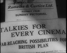 A Shot of the Film Weekly. Headline Reads: 'Talkies for Every Cinema. Far Reaching..., 1929. Creator: British Pathe Ltd.
